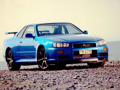 A blue Nissan Skyline R34 GT-R.